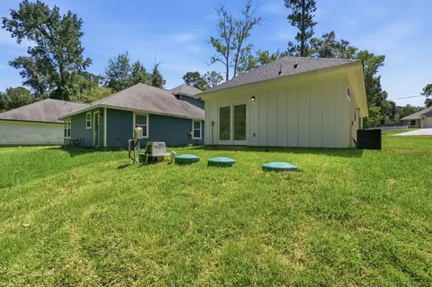 Exterior - 15290 Arrowhead Loop W, Willis, TX 77378 photo 4 of 6