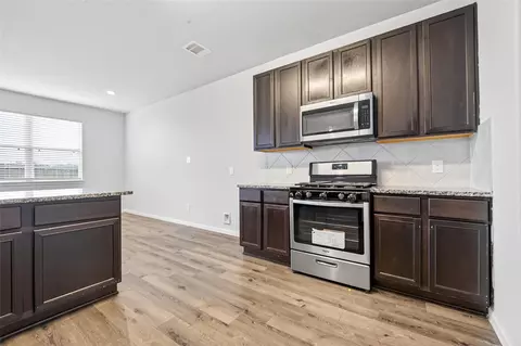 Kitchen - 4818 Blue Jacaranda Way, Spring, TX 77373 photo 2 of 2