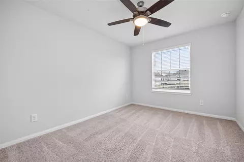 Bedroom - 4818 Blue Jacaranda Way, Spring, TX 77373 photo 8 of 11