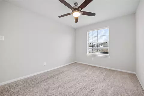 Bedroom - 4818 Blue Jacaranda Way, Spring, TX 77373 photo 7 of 11