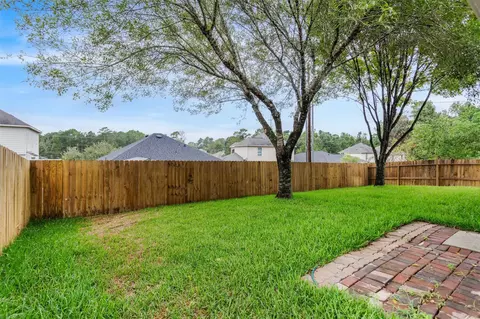 Exterior - 14099 Running Bear Dr, Willis, TX 77378 photo 5 of 6
