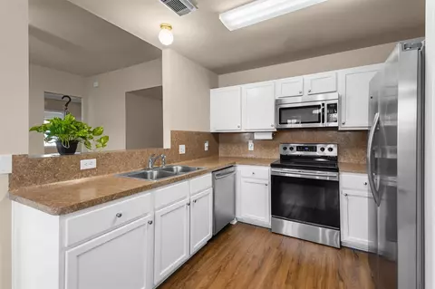 Kitchen - 14099 Running Bear Dr, Willis, TX 77378 photo 3 of 4