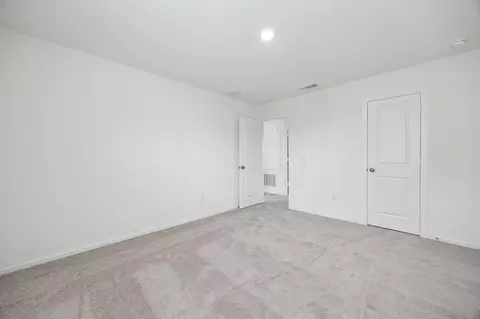Bedroom - 15877 Blass Valley Dr, Conroe, TX 77302 photo 9 of 10