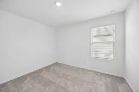 Bedroom - 15877 Blass Valley Dr, Conroe, TX 77302 photo 6 of 10