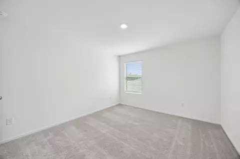 Bedroom - 15877 Blass Valley Dr, Conroe, TX 77302 photo 10 of 10