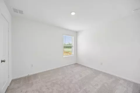 Bedroom - 15877 Blass Valley Dr, Conroe, TX 77302 photo 8 of 10