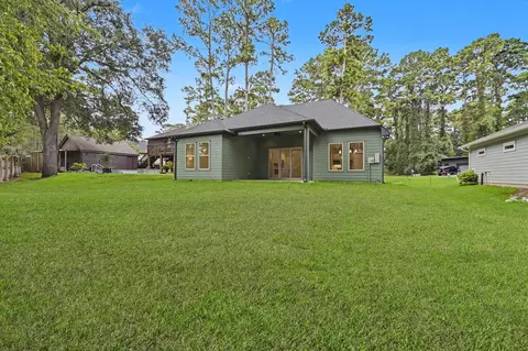 Exterior - 13962 Dolphin Dr, Willis, TX 77318 photo 10 of 11