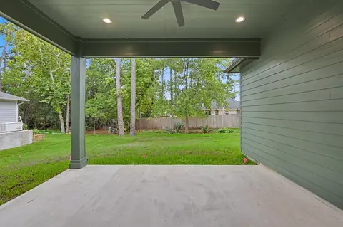 Exterior - 13962 Dolphin Dr, Willis, TX 77318 photo 7 of 11