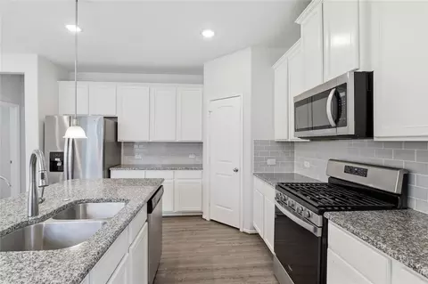 Kitchen - 17706 White Lightning Way, Spring, TX 77379 photo 2 of 3