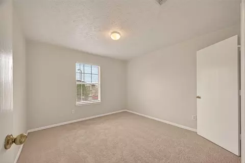 Bedroom - 1902 Flycaster Dr, Spring, TX 77388 photo 2 of 10
