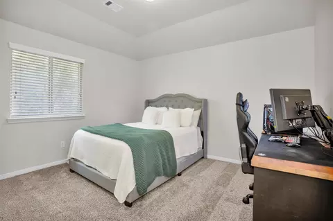Bedroom - 9587 E Woodmark, Conroe, TX 77304 photo 10 of 12