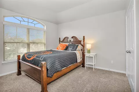 Bedroom - 9587 E Woodmark, Conroe, TX 77304 photo 6 of 12