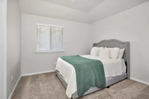 Bedroom - 9587 E Woodmark, Conroe, TX 77304 photo 11 of 12