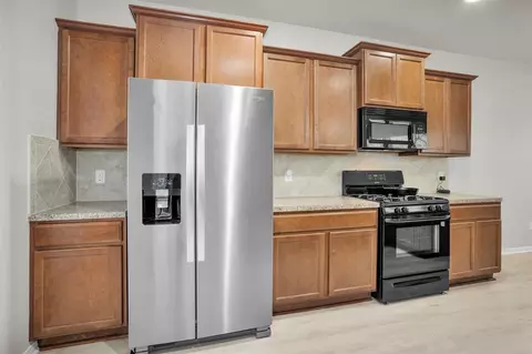 Kitchen - 9587 E Woodmark, Conroe, TX 77304 photo 2 of 2