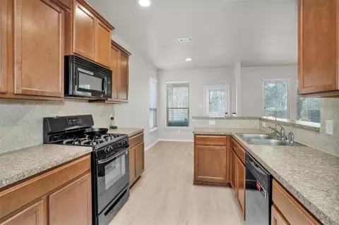 Kitchen - 9587 E Woodmark, Conroe, TX 77304 photo 1 of 2