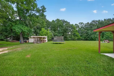 Exterior - 26633 Ruby St, Splendora, TX 77372 photo 7 of 16