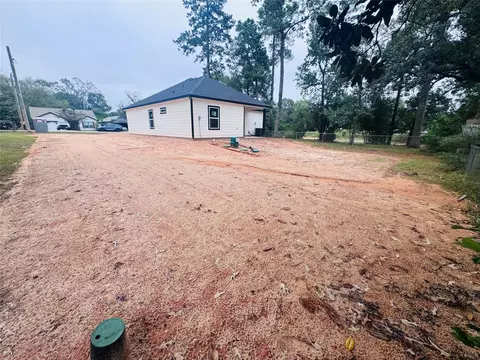 Exterior - 14863 Big Spring Cir, Willis, TX 77378 photo 2 of 3
