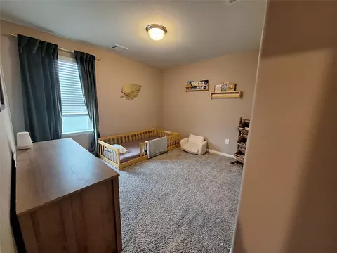 Bedroom - 17610 Rosette Grass Dr, Conroe, TX 77385 photo 5 of 5