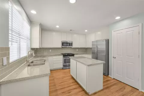 Kitchen - 22 E New Avery Pl, Spring, TX 77382 photo 1 of 4