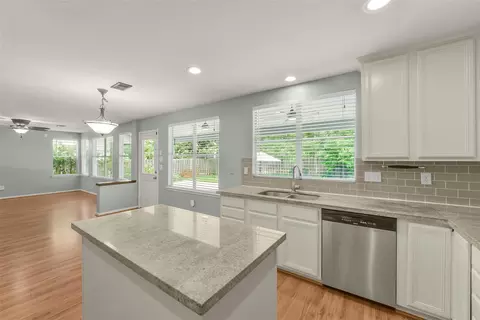 Kitchen - 22 E New Avery Pl, Spring, TX 77382 photo 3 of 4
