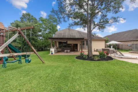 Exterior - 35 Nagshead Pl, Spring, TX 77389 photo 10 of 12