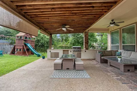 Exterior - 35 Nagshead Pl, Spring, TX 77389 photo 4 of 12