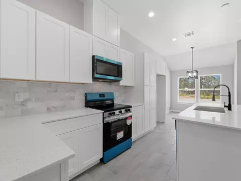 Kitchen - 413 S 12th St, Conroe, TX 77301 photo 2 of 4