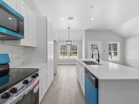 Kitchen - 413 S 12th St, Conroe, TX 77301 photo 4 of 4