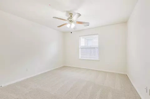 Bedroom - 2415 Fox River Ln, Spring, TX 77386 photo 5 of 6