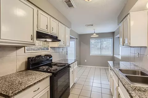 Kitchen - 5607 Circlegate Dr, Spring, TX 77373 photo 1 of 2
