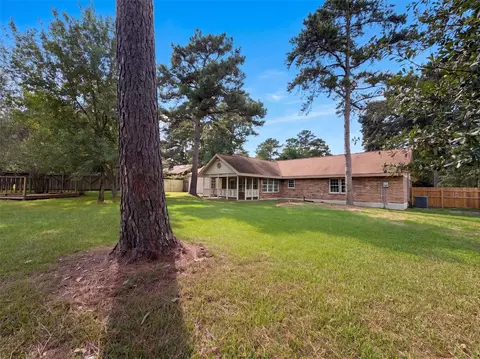 Exterior - 1119 Coe Rd, Pinehurst, TX 77362 photo 2 of 3