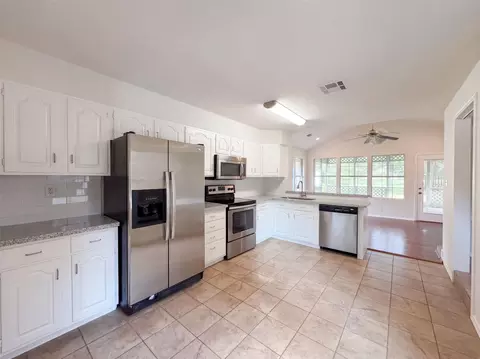 Kitchen - 1119 Coe Rd, Pinehurst, TX 77362 photo 1 of 3