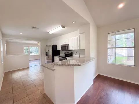 Kitchen - 1119 Coe Rd, Pinehurst, TX 77362 photo 3 of 3
