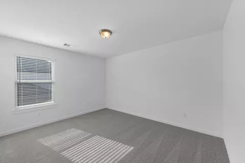 Bedroom - 64 Shining Point Dr, Waller, TX 77484 photo 4 of 5