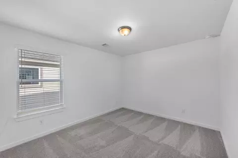 Bedroom - 64 Shining Point Dr, Waller, TX 77484 photo 3 of 5