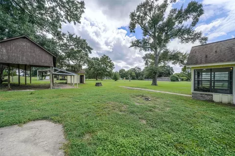 Exterior - 7622 County Line Rd, Willis, TX 77378 photo 4 of 10