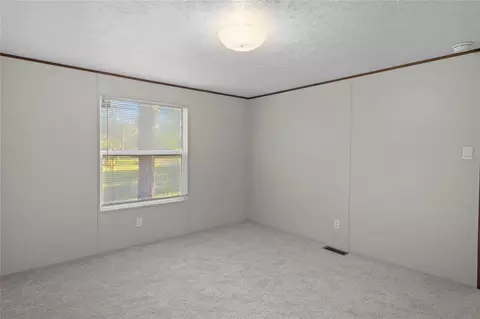 Bedroom - 16889 Springfield Dr, Conroe, TX 77302 photo 7 of 10