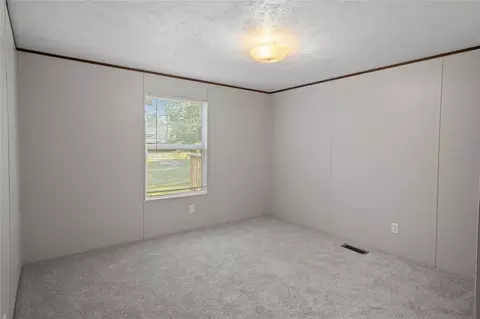 Bedroom - 16889 Springfield Dr, Conroe, TX 77302 photo 5 of 10