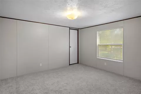 Bedroom - 16889 Springfield Dr, Conroe, TX 77302 photo 8 of 10