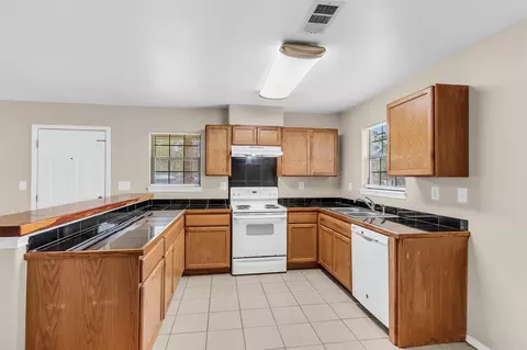 Kitchen - 14236 E Ravine Run, Willis, TX 77318 photo 1 of 2