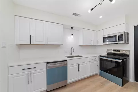 Kitchen - 7910 Oak Moss Dr, Spring, TX 77379 photo 2 of 3