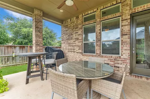 Exterior - 561 Rolling Brook Ln, Pinehurst, TX 77362 photo 5 of 6