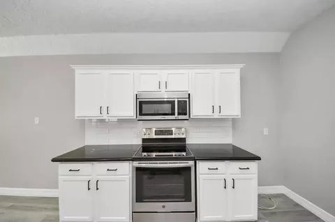 Kitchen - 1105 E Kyle Rd, Clute, TX 77531 photo 2 of 4