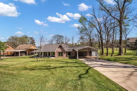 Exterior - 310 Cove Loop, Coldspring, TX 77331 photo 1 of 13