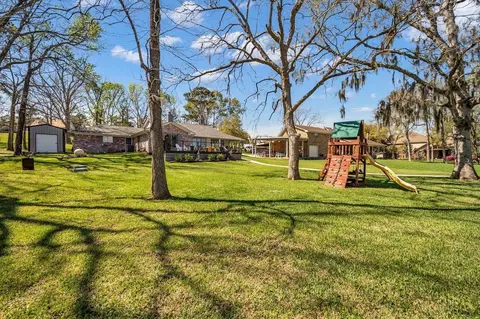 Exterior - 310 Cove Loop, Coldspring, TX 77331 photo 10 of 13