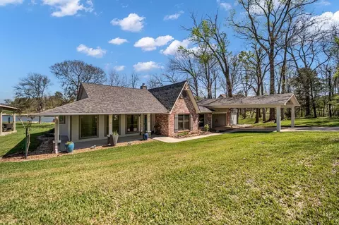 Exterior - 310 Cove Loop, Coldspring, TX 77331 photo 3 of 13