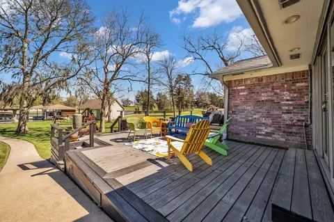 Exterior - 310 Cove Loop, Coldspring, TX 77331 photo 5 of 13