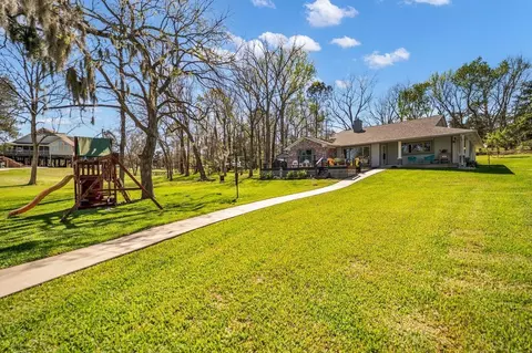Exterior - 310 Cove Loop, Coldspring, TX 77331 photo 9 of 13