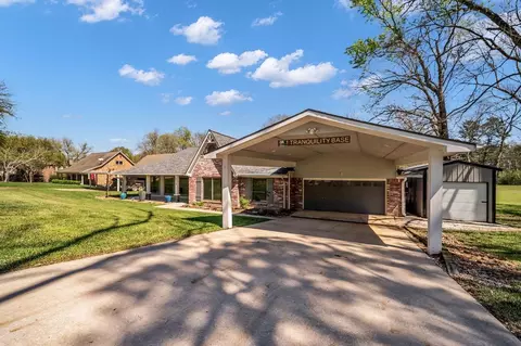 Exterior - 310 Cove Loop, Coldspring, TX 77331 photo 2 of 13