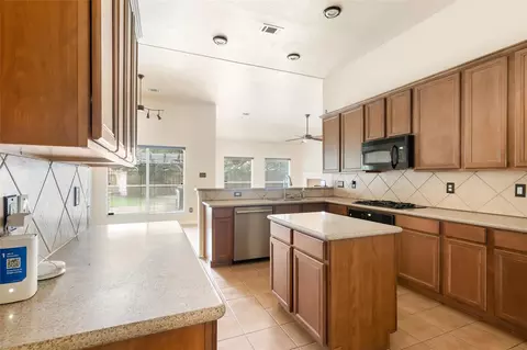 Kitchen - 24706 E Burnaby Cir, Spring, TX 77373 photo 3 of 3